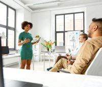 woman pitching startup to investors